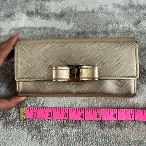 Authentic Gold Salvatore ferragamo wallet.